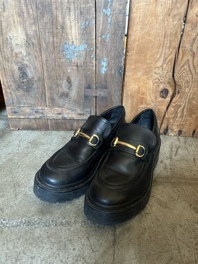 Black Loafers with Gold Accent